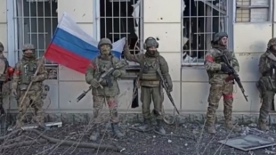 18.02.2024. Бойцы 24-й бригады спецназа и 239-го полка подняли флаги России над Авдеевкой